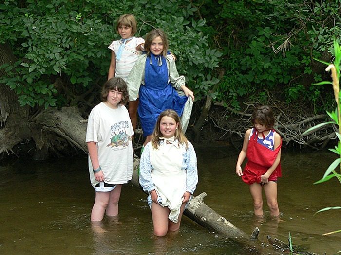 Wading in Plum Creek in Walnut Grove, MN.