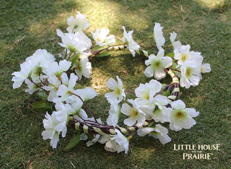 Tie the ends of the ribbons to secure the wreath.