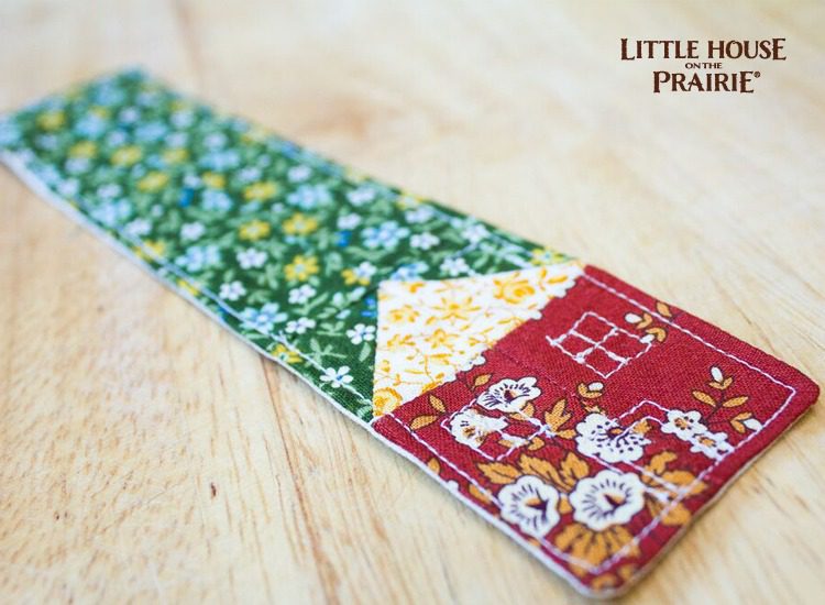 Simple, quilted house makes a fabric bookmark inspired by Little House on the Prairie.