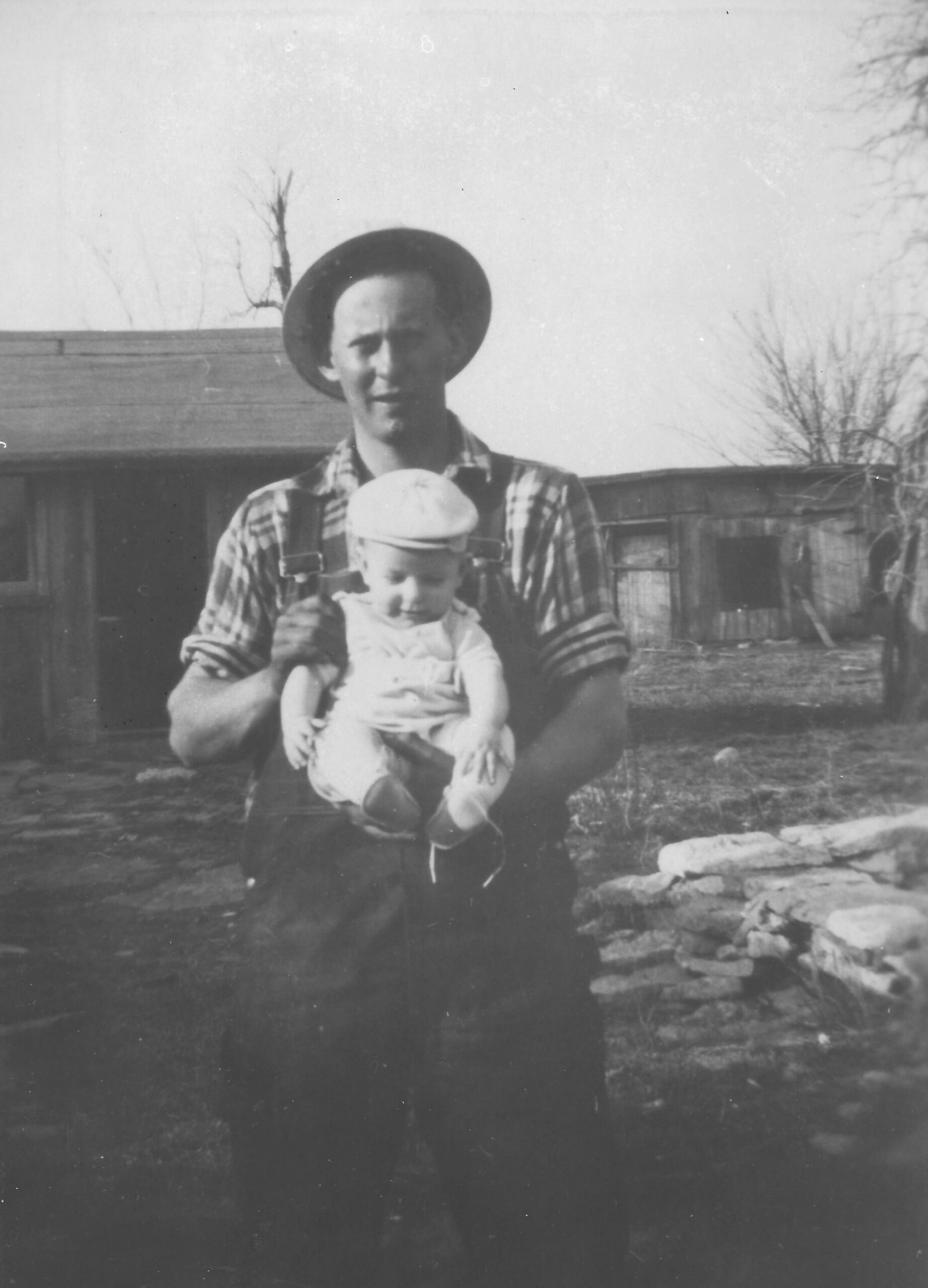 Victor W. Hines with his 15-month old son Stephen on the family farm near Plum Creek, Kansas. Photo courtesy of Stephen W. Hines.